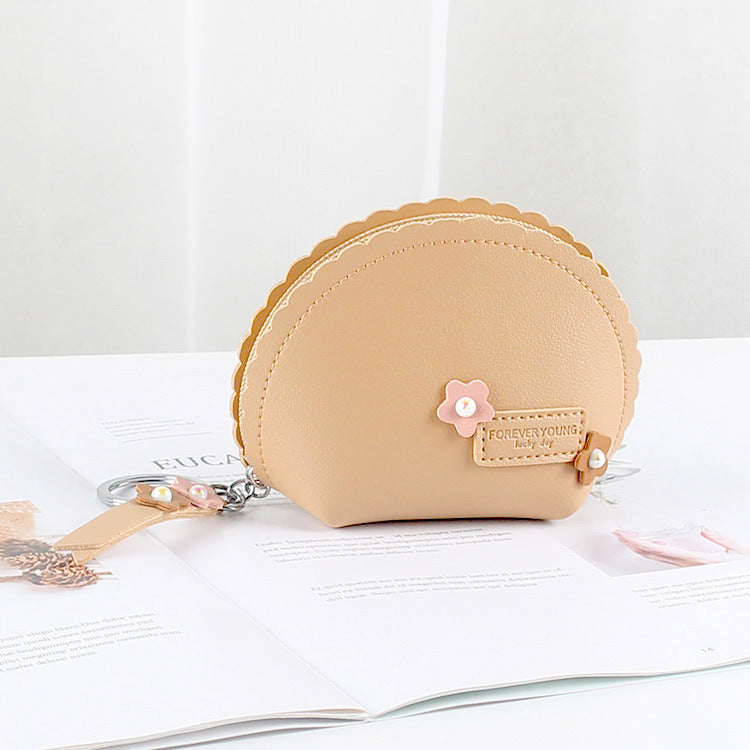 Women's Hand Holding Coin Purse