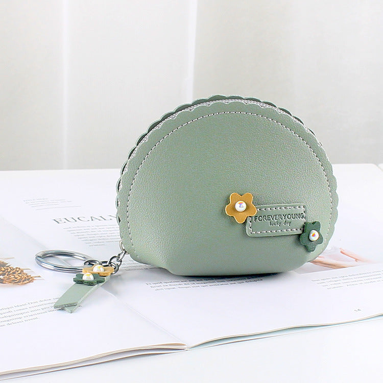 Women's Hand Holding Coin Purse